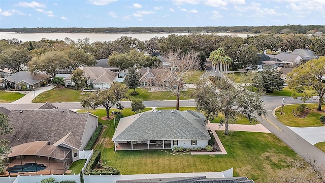 drone / aerial view featuring a water view