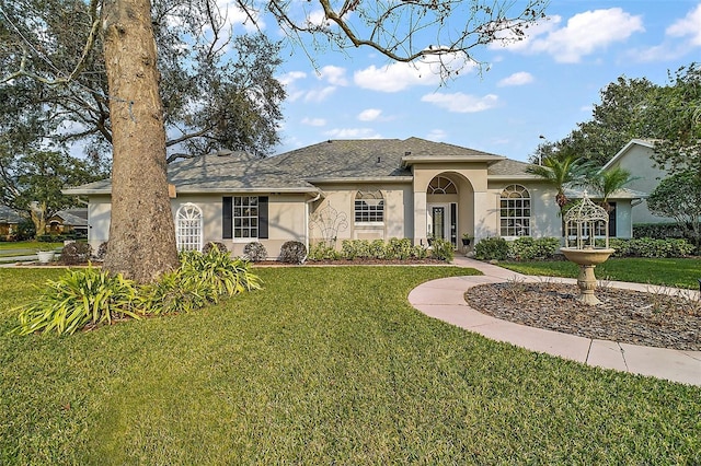 view of front of house with a front lawn