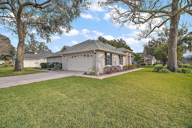 ranch-style house featuring a garage and a front yard