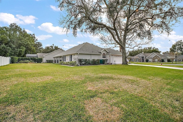 view of yard with a garage