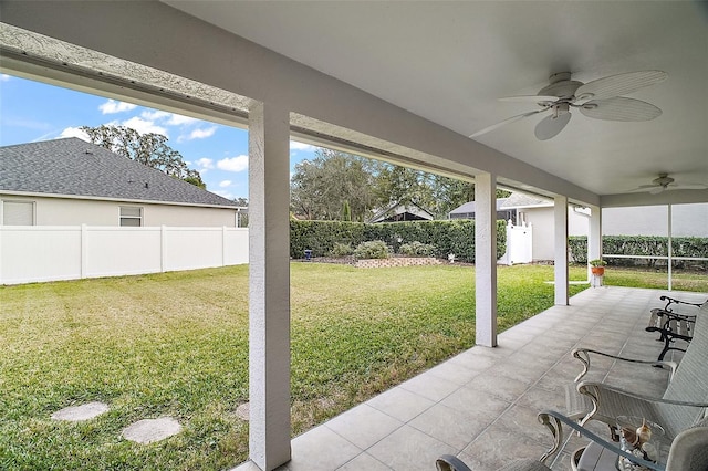 exterior space with a patio and ceiling fan