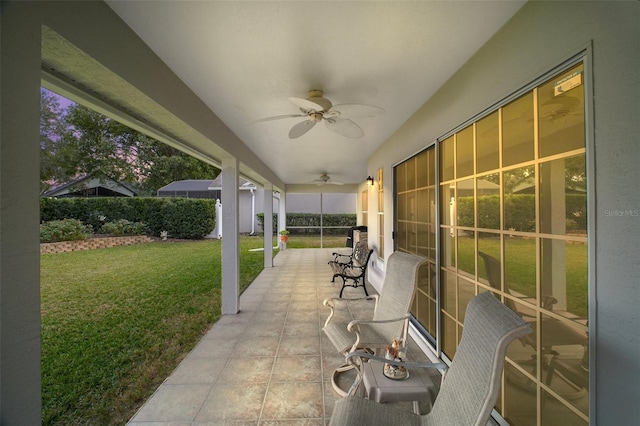 view of patio with ceiling fan