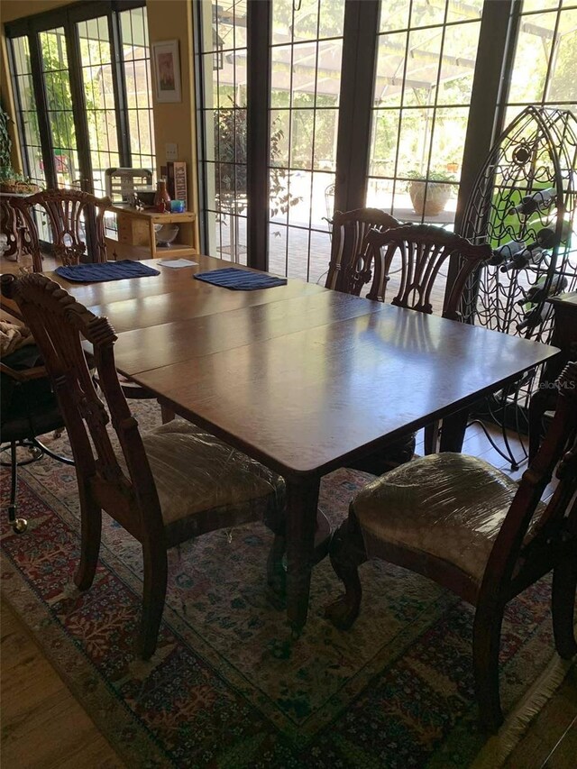 dining room with wood finished floors