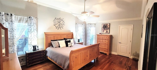 bedroom featuring crown molding, dark hardwood / wood-style floors, and ceiling fan