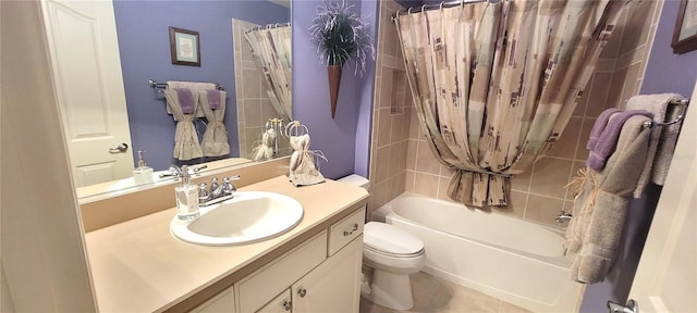 full bathroom featuring vanity, shower / bath combination with curtain, and toilet