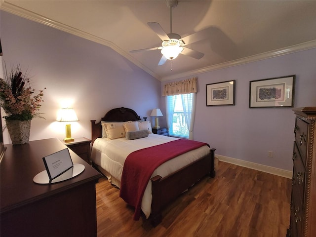 bedroom with lofted ceiling, dark wood-type flooring, ornamental molding, and ceiling fan