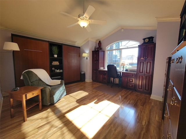 office with crown molding, vaulted ceiling, light hardwood / wood-style floors, and ceiling fan