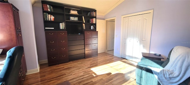 sitting room featuring hardwood / wood-style flooring and vaulted ceiling