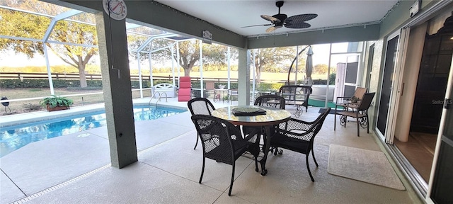 exterior space featuring ceiling fan