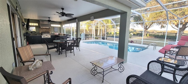 view of swimming pool with a patio, a lanai, and area for grilling