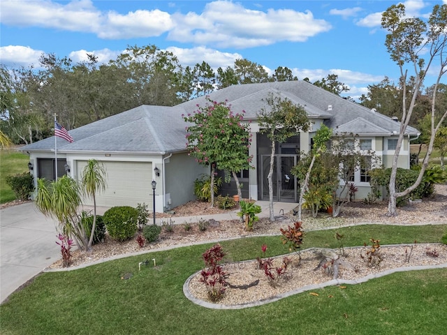 single story home with a garage and a front yard