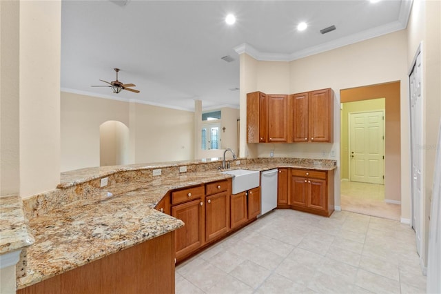 kitchen featuring sink, white dishwasher, kitchen peninsula, light stone countertops, and ornamental molding