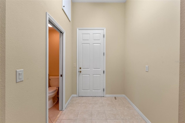 entryway featuring light tile patterned floors