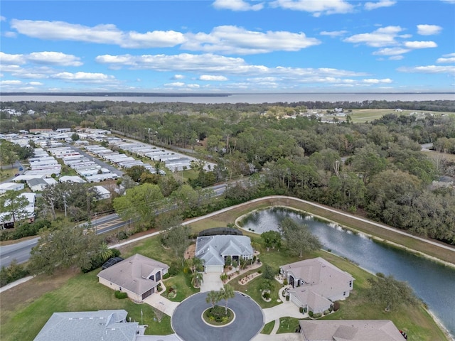 drone / aerial view with a water view