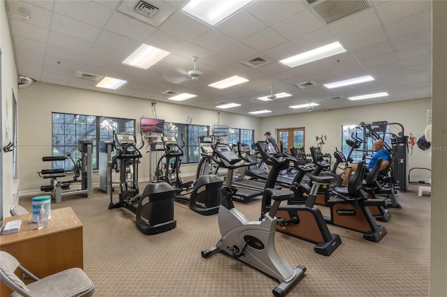 gym with a drop ceiling