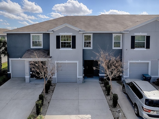 front of property with a garage