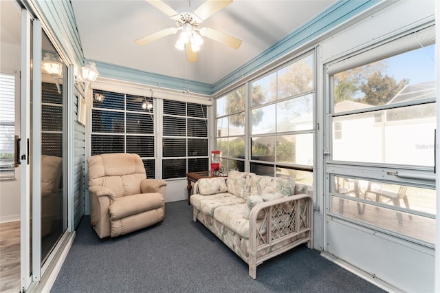 sunroom / solarium with ceiling fan