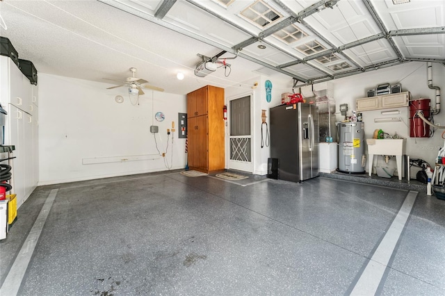 garage with sink, a garage door opener, water heater, electric panel, and stainless steel refrigerator with ice dispenser