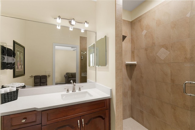 bathroom with a stall shower and vanity