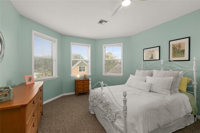 bedroom featuring carpet, visible vents, and baseboards