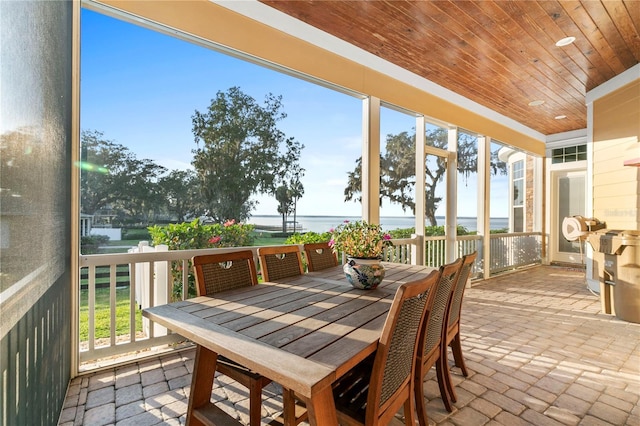 sunroom with wood ceiling