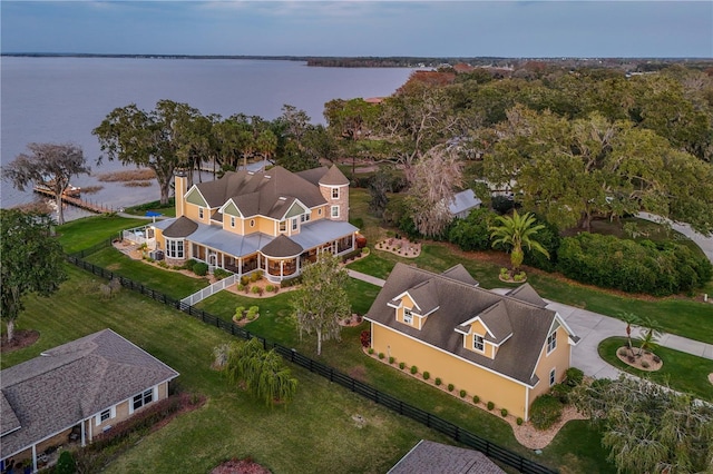 drone / aerial view with a water view