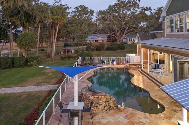 view of pool featuring a patio area, a fenced backyard, a fenced in pool, and a yard