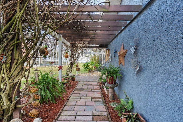 exterior space featuring a pergola