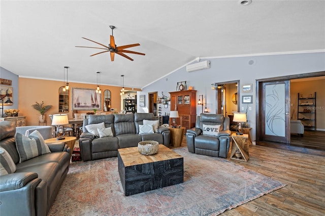 living room with lofted ceiling, ceiling fan, hardwood / wood-style floors, a wall mounted air conditioner, and ornamental molding