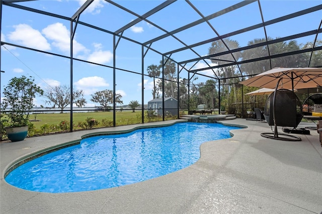 view of pool featuring an in ground hot tub, a lanai, a shed, and a patio area