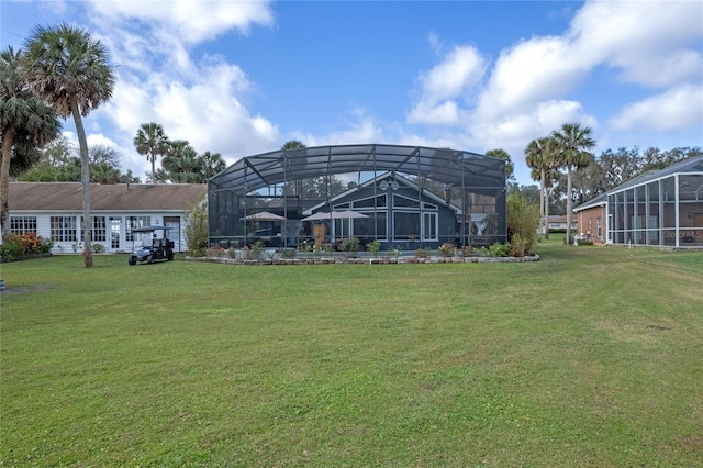 view of yard with a lanai