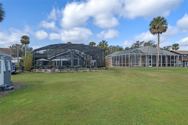 view of yard featuring a lanai