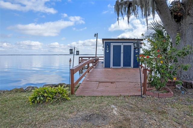 dock area with a water view