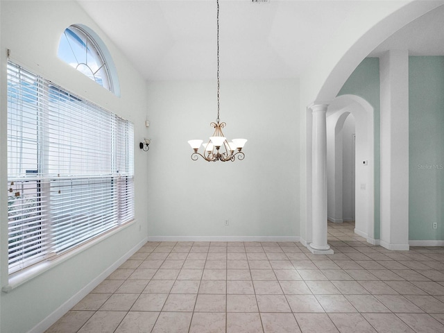 unfurnished dining area with arched walkways, plenty of natural light, light tile patterned floors, and lofted ceiling