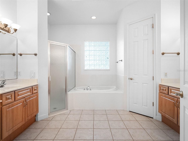 bathroom featuring a shower stall, tile patterned flooring, vanity, and a bath