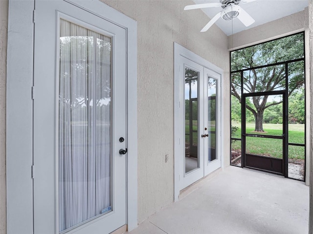 unfurnished sunroom featuring french doors
