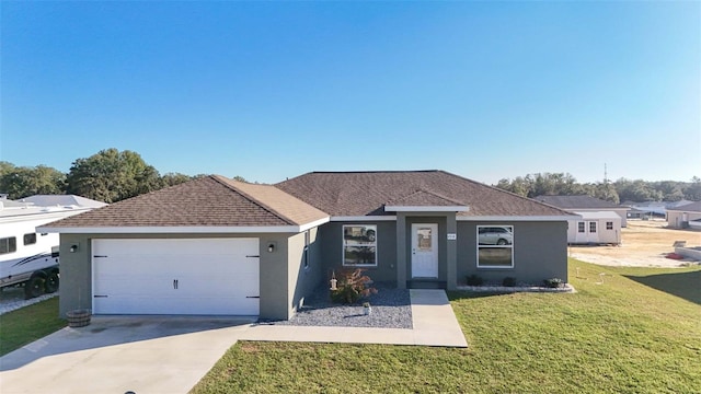 ranch-style house with a garage and a front lawn