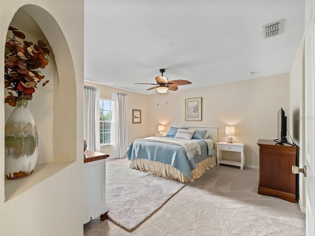 carpeted bedroom featuring ceiling fan