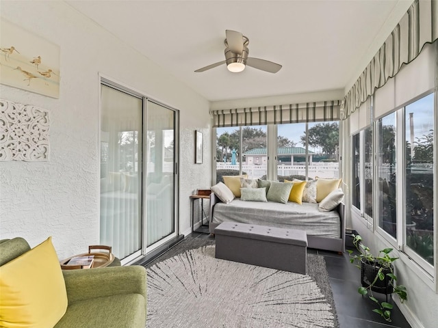 sunroom / solarium with ceiling fan