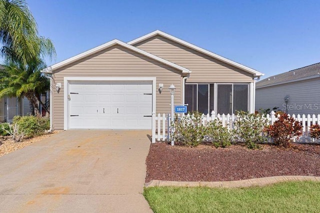 ranch-style home with a garage