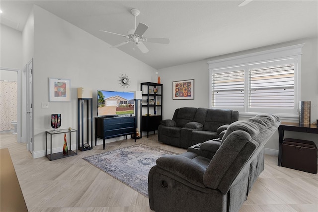 living room with high vaulted ceiling and ceiling fan