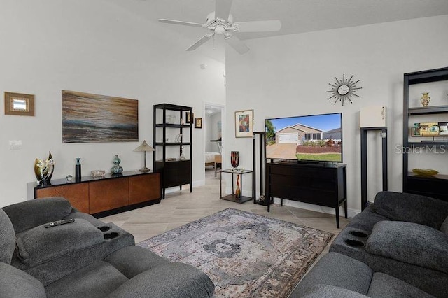 living room with light tile patterned flooring, ceiling fan, and high vaulted ceiling