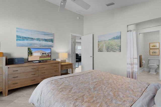 bedroom with ceiling fan and ensuite bathroom