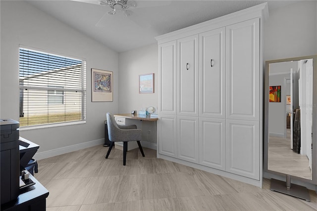 office area with ceiling fan and vaulted ceiling