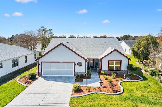 view of front facade with a front lawn and a garage