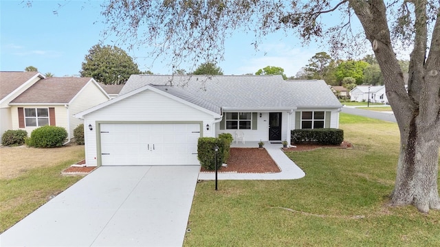 ranch-style home with a garage and a front yard
