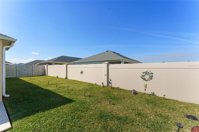 6576 Merrill Ln, The Villages, FL 34762 - view of yard with a fenced backyard