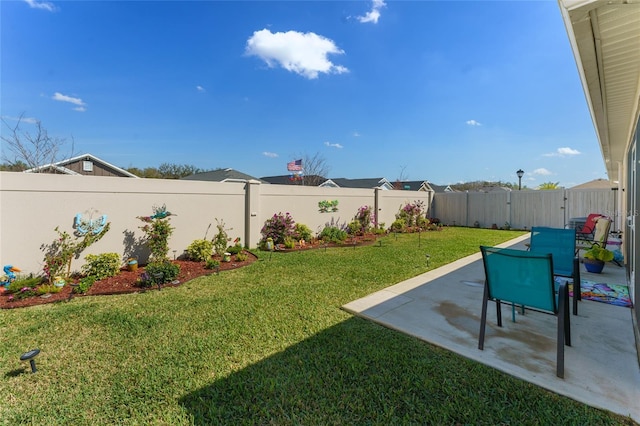 6576 Merrill Ln, The Villages, FL 34762 - view of yard featuring a fenced backyard and a patio area