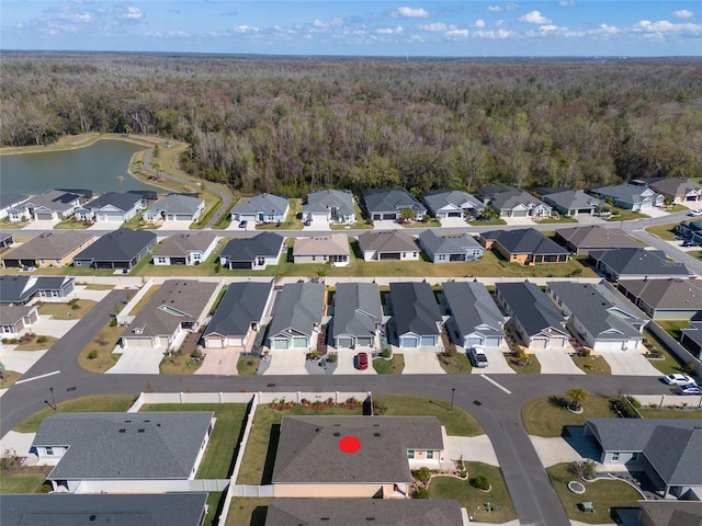 6576 Merrill Ln, The Villages, FL 34762 - bird's eye view featuring a residential view, a water view, and a forest view