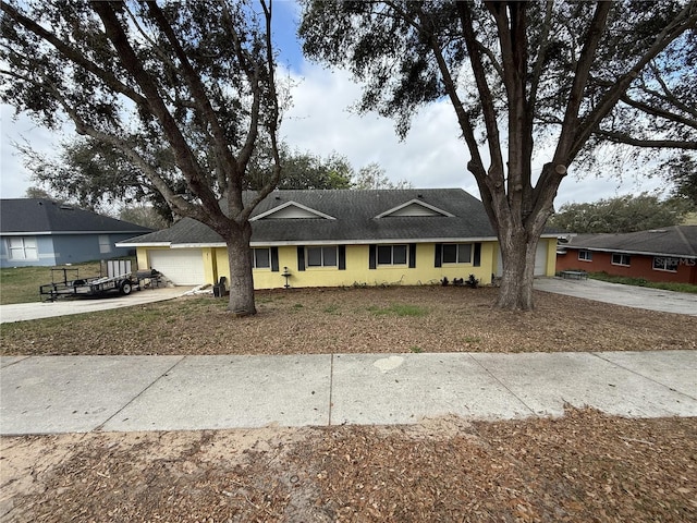 ranch-style house with a garage